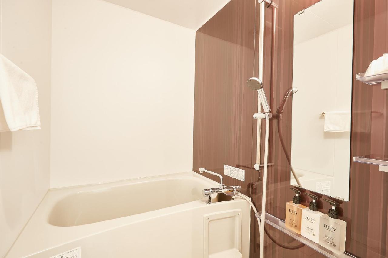 New Normal Hotel In Nago ニューノーマルホテルイン名護 Экстерьер фото